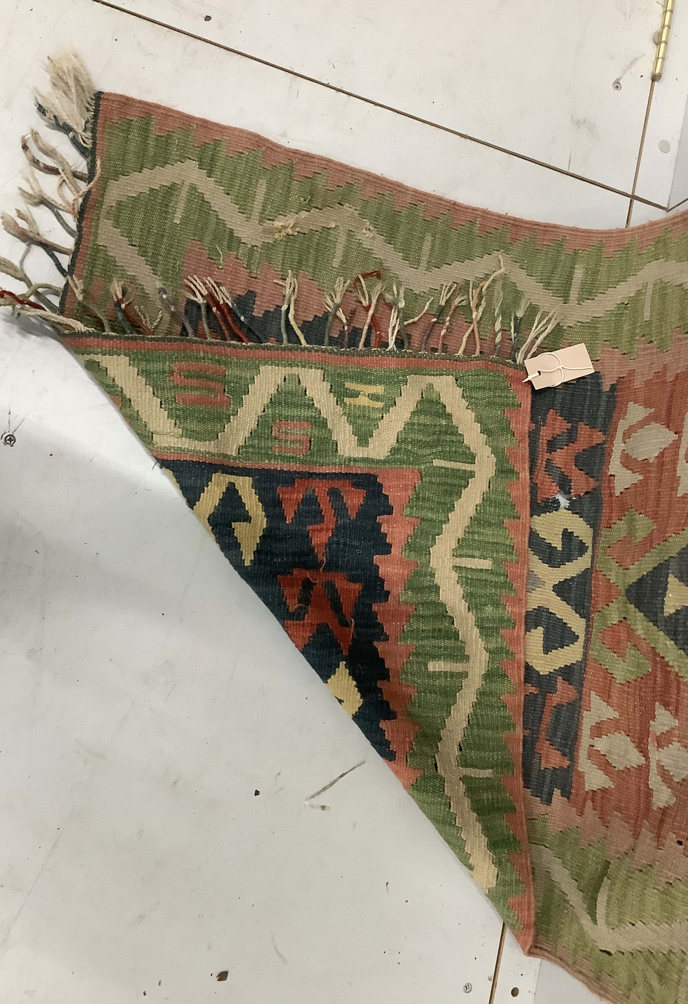 A Kilim polychrome flatweave runner, 280 x 78cm